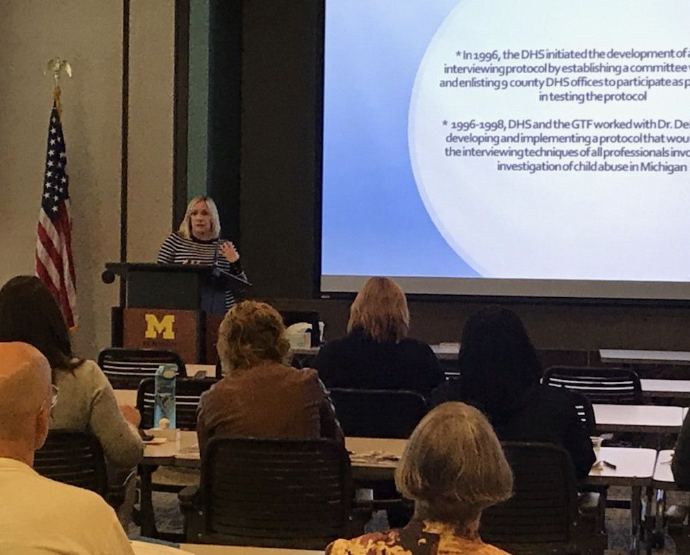 Megan Aukerman, Drug Endangered Children Specialist from the Child Abuse Training Unit of the Prosecuting Attorneys Association of Michigan addresses the symposium.